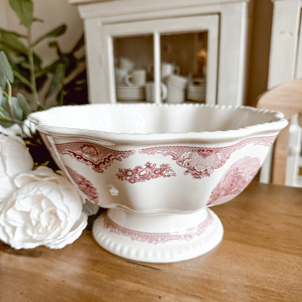 Johnson Brothers Old Britain Castles pink transferware pedestal serving bowl, front view showing scalloped rim and castle scene